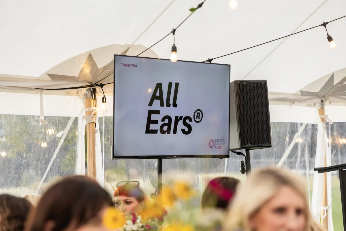 86 inch TV on a stand in a marquee at Dine for a Cure - TV hire Christchurch, event AV Canterbury