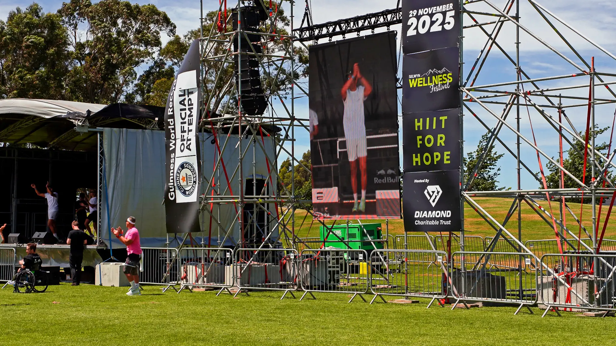 Hiit For Hope staging audio screens site power - professional AV hire Christchurch, event production Canterbury