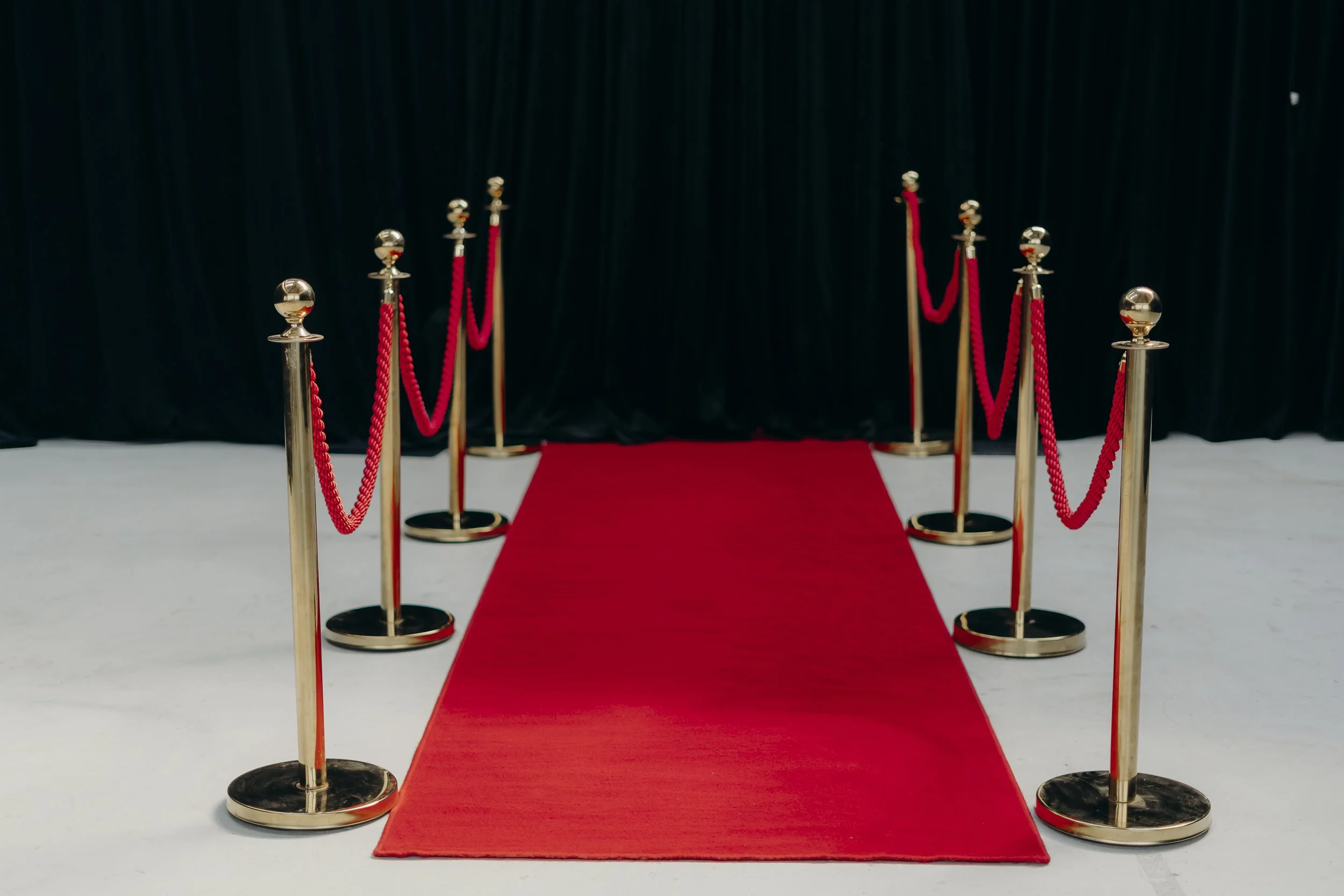 Red carpet entrance photography at a school formal